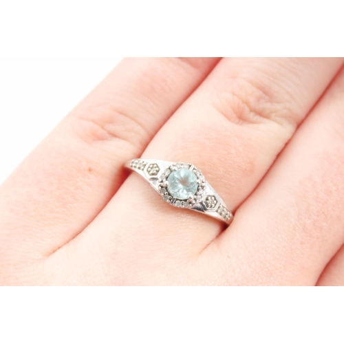 276 - Aquamarine Centre Stone Ring with Diamond Halo Set Mounted in 9 Carat White Gold with Further Diamon... 