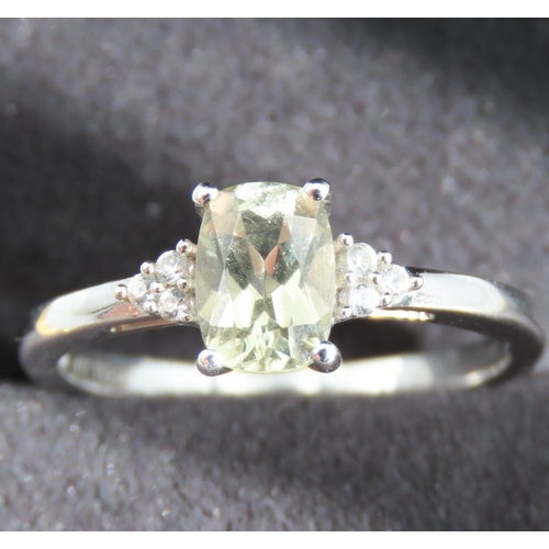 277 - Pale Peridot and Gemstone Set Ring Mounted in 10 Carat White gold Ring Size N and a Half