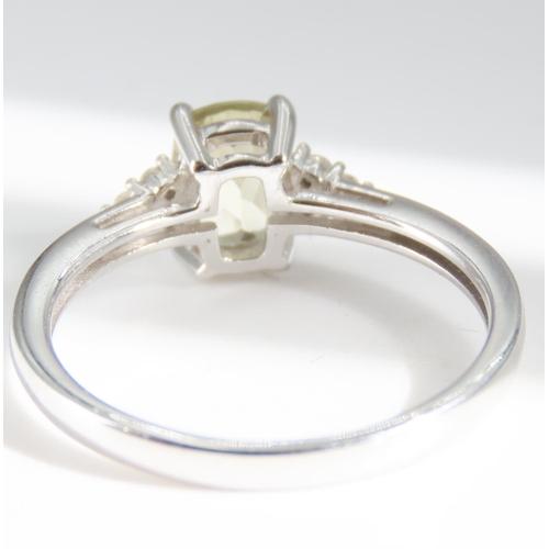 277 - Pale Peridot and Gemstone Set Ring Mounted in 10 Carat White gold Ring Size N and a Half