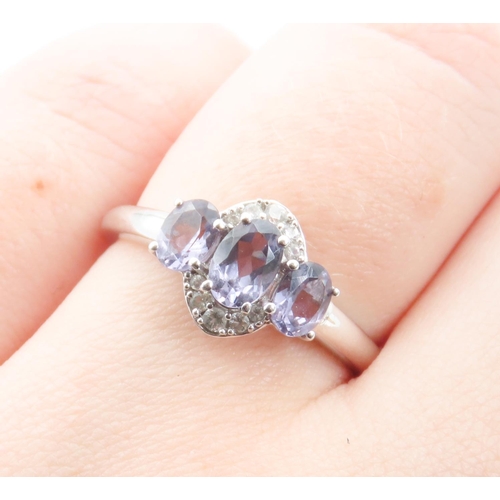 283 - Three Stone Purple Spinel Ring Set with Diamonds Mounted in 10  Carat White Gold Ring Size N and a H... 