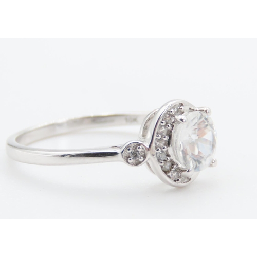 284 - Glacier Topaz and Diamond Set Ladies Ring Mounted in 10 Carat White Gold Ring Size N and a Half