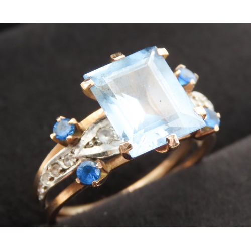 Emerald Cut Aquamarine and Gemstone Set Ring Mounted in 18 Carat Yellow Gold Ring Size Q