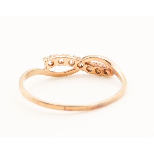 294 - Gemset Infinity Form Ring Mounted in 9 Carat Yellow Gold Ring Size L