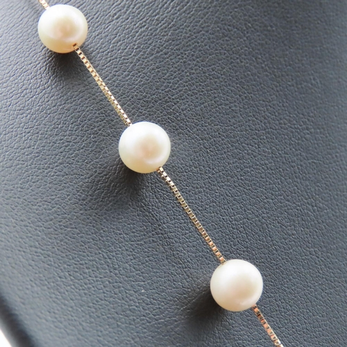 3 - Ladies 18 Carat Yellow Gold Pearl Necklace Set with Nineteen Pearls of Attractive Lustre 46cm Long