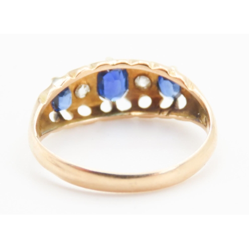 300 - Three Stone Sapphire and Diamond Set Ring Mounted in 18 Carat Yellow Gold Ring Size J