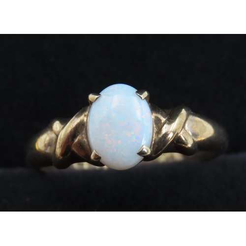 310 - Opal Set 9 Carat Yellow Gold Four Claw Setting Ring Size O