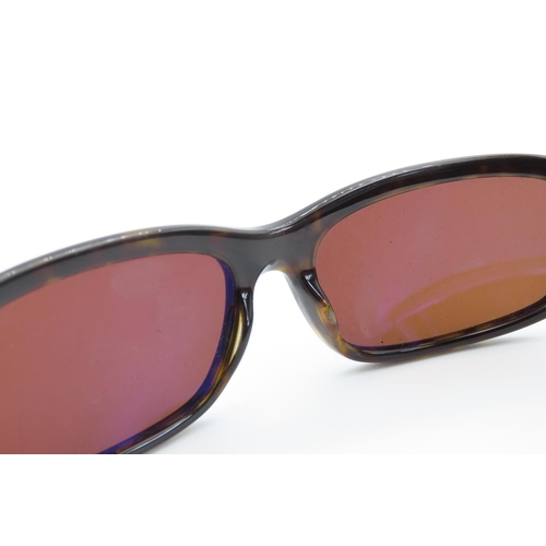 330 - Ladies Sunglasses by Prada