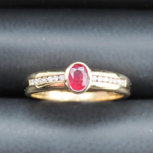 35 - Bezel Set Ruby Ring Mounted in 18 Carat Yellow Gold with Further Diamonds Set to Band Ring Size O