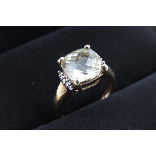 365 - Cushion Cut Pale Green Amethyst Ring Mounted in 9 Carat Yellow Gold with Further Diamonds Set to Sho... 