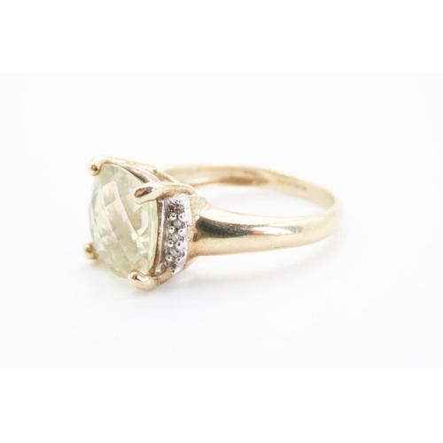 365 - Cushion Cut Pale Green Amethyst Ring Mounted in 9 Carat Yellow Gold with Further Diamonds Set to Sho... 