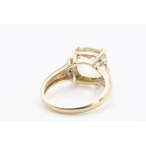 365 - Cushion Cut Pale Green Amethyst Ring Mounted in 9 Carat Yellow Gold with Further Diamonds Set to Sho... 