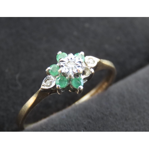 372 - Emerald and Diamond Set Cluster Ring Mounted in 9 Carat Yellow Gold ring Size N