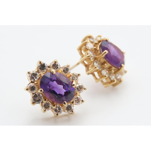 417 - Pair of 14 Carat Yellow Gold Amethyst and Diamond Set Cluster Earrings