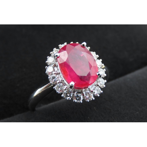 421 - Ruby and Diamond Set Cluster Ring Mounted in 18 Carat White Gold Ring Size N