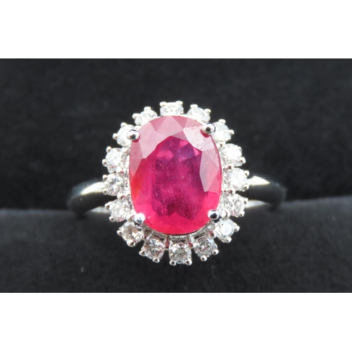 421 - Ruby and Diamond Set Cluster Ring Mounted in 18 Carat White Gold Ring Size N