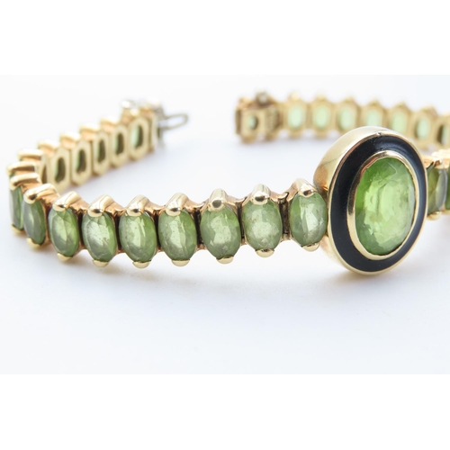 422 - 18 Carat Yellow Gold Peridot Set Bracelet with Bezel Set Centre Stone Black Enamel Detailing 16.5cm ... 