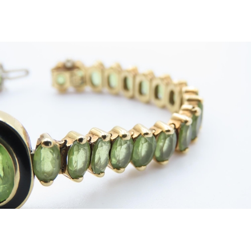 422 - 18 Carat Yellow Gold Peridot Set Bracelet with Bezel Set Centre Stone Black Enamel Detailing 16.5cm ... 