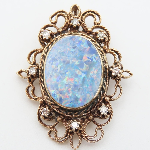 431 - Attractively Detailed Opal and Eight Diamond Set Brooch Mounted in 14 Carat Yellow Gold 5cm High