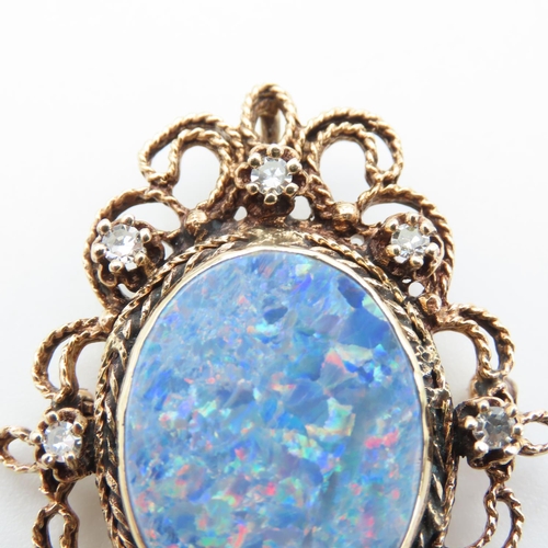 431 - Attractively Detailed Opal and Eight Diamond Set Brooch Mounted in 14 Carat Yellow Gold 5cm High