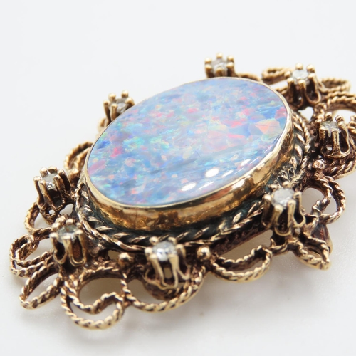 431 - Attractively Detailed Opal and Eight Diamond Set Brooch Mounted in 14 Carat Yellow Gold 5cm High