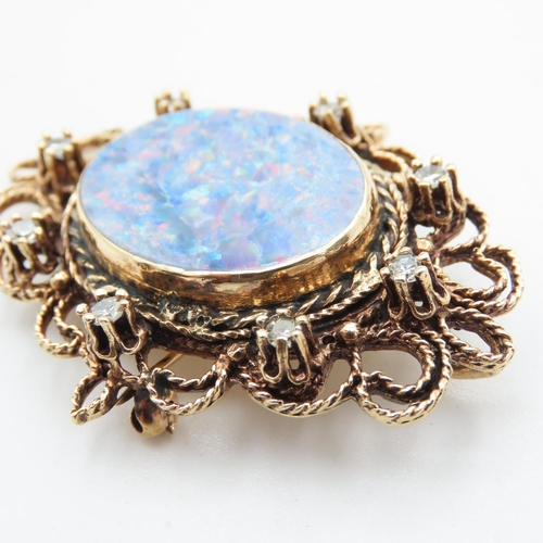 431 - Attractively Detailed Opal and Eight Diamond Set Brooch Mounted in 14 Carat Yellow Gold 5cm High