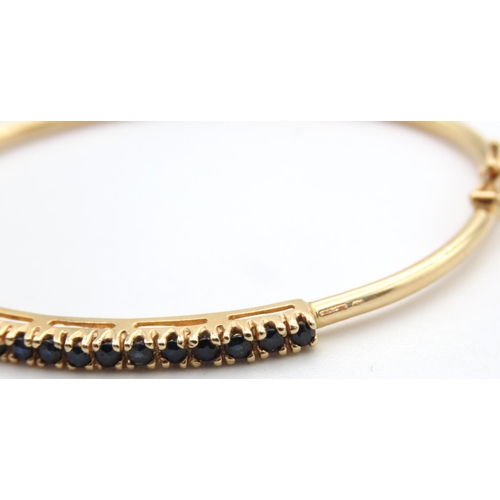 446 - Fifteen Stone Sapphire Set Bangle Mounted in 14 Carat Yellow Gold Inner Width 5.5cm