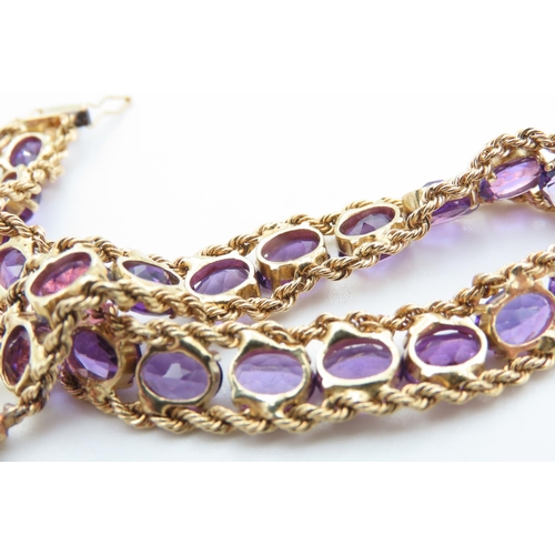 467 - Amethyst Set Bracelet Mounted in 14 Carat Yellow Gold with Rope Chain Detailing 17.5cm Long