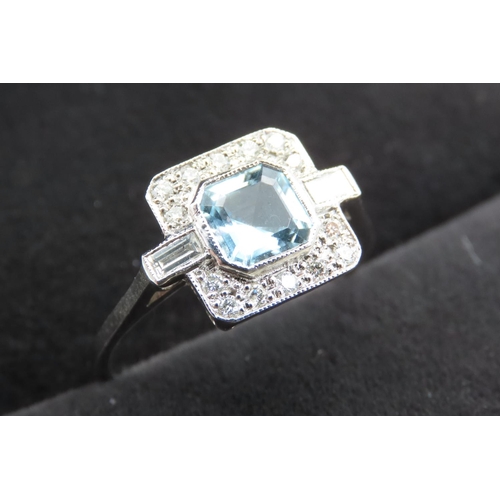 472 - Aquamarine and Diamond Set Ladies Cluster Ring Mounted in 18 Carat White Gold Ring Size O