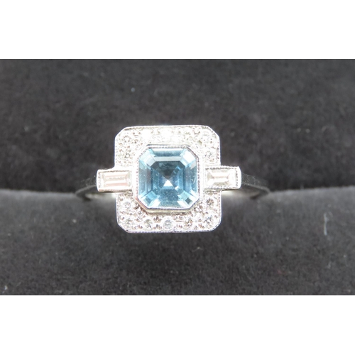 472 - Aquamarine and Diamond Set Ladies Cluster Ring Mounted in 18 Carat White Gold Ring Size O