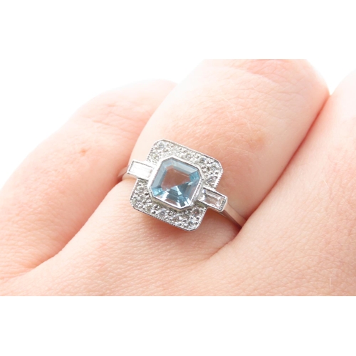 472 - Aquamarine and Diamond Set Ladies Cluster Ring Mounted in 18 Carat White Gold Ring Size O