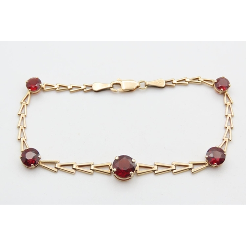 Five Stone Gradual Red Garnet Set Bracelet Mounted in 14 Carat Yellow Gold 16.5cm Long