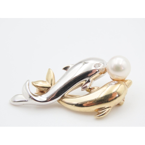 64 - 9 Carat Yellow and White Gold Twin Dolphin Motif Brooch with Pearl and Diamond Decoration 3.5cm Wide