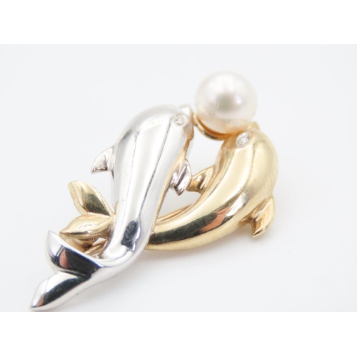 64 - 9 Carat Yellow and White Gold Twin Dolphin Motif Brooch with Pearl and Diamond Decoration 3.5cm Wide