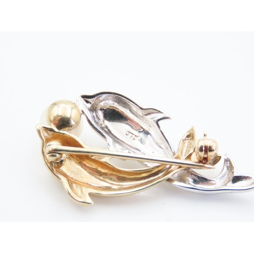 64 - 9 Carat Yellow and White Gold Twin Dolphin Motif Brooch with Pearl and Diamond Decoration 3.5cm Wide