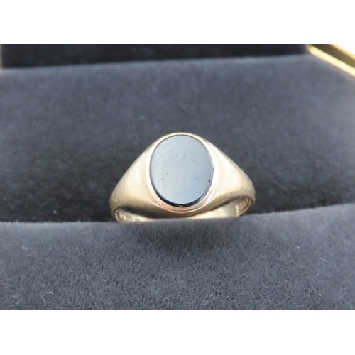 66 - Black Onyx Panel Signet Ring Set in 9 Carat Yellow Gold Ring Size O