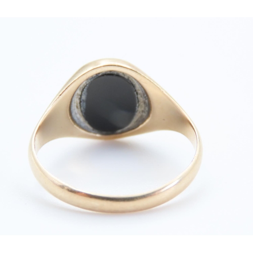 66 - Black Onyx Panel Signet Ring Set in 9 Carat Yellow Gold Ring Size O