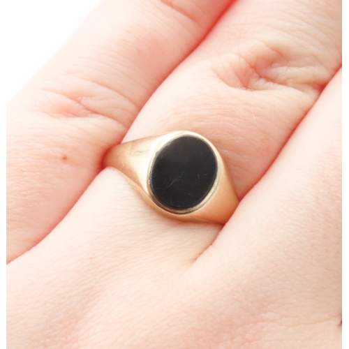 66 - Black Onyx Panel Signet Ring Set in 9 Carat Yellow Gold Ring Size O