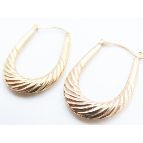 71 - Pair of 9 Carat Yellow Gold Twist Form Hoop Earrings Each 3.5cm High