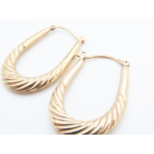 71 - Pair of 9 Carat Yellow Gold Twist Form Hoop Earrings Each 3.5cm High