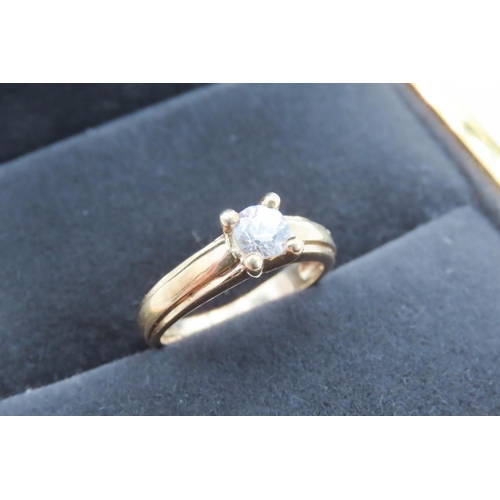 94 - Glacier Topaz Set Solitaire Ring Mounted in 9 Carat Yellow Gold Ring Size N