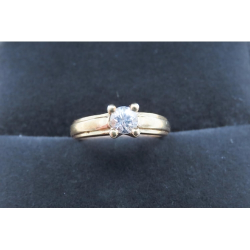 94 - Glacier Topaz Set Solitaire Ring Mounted in 9 Carat Yellow Gold Ring Size N