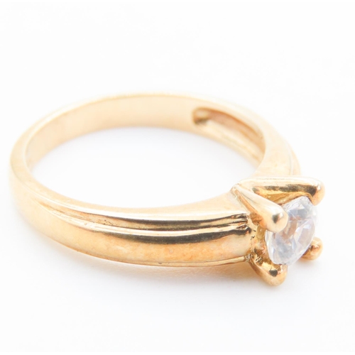 94 - Glacier Topaz Set Solitaire Ring Mounted in 9 Carat Yellow Gold Ring Size N