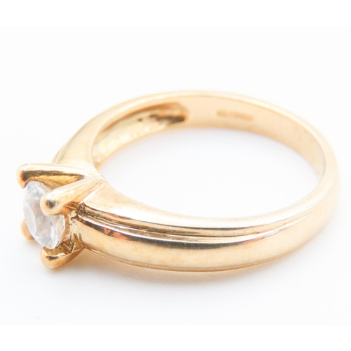 94 - Glacier Topaz Set Solitaire Ring Mounted in 9 Carat Yellow Gold Ring Size N