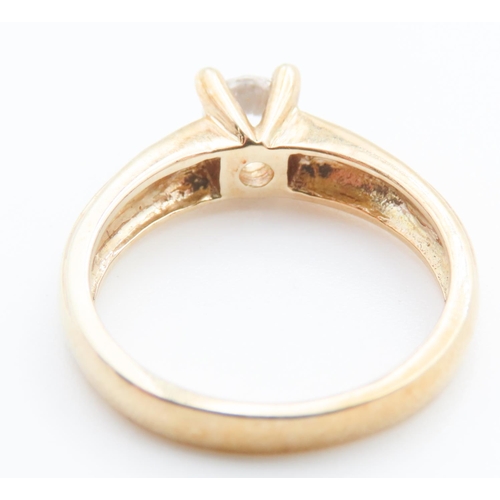 94 - Glacier Topaz Set Solitaire Ring Mounted in 9 Carat Yellow Gold Ring Size N