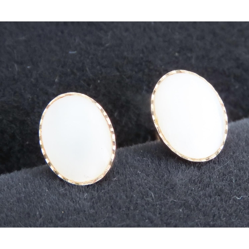 99 - Pair of 9 Carat Yellow Gold Mother of Pearl Set Earrings