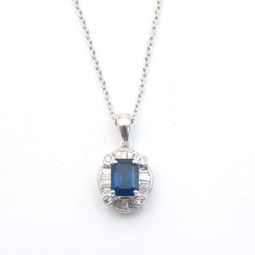 177 - Emerald Cut Sapphire Pendant with Tempered Baguette Diamond Surround Mounted in 18 Carat White Gold ... 