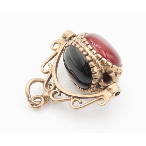 104 - Polished Bloodstone Carnelian and Black Onyx Swivel Pendant Set in 9 Carat Yellow Gold 2cm High