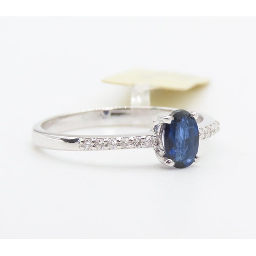 112 - Four Claw Set Sapphire Ring Mounted in 18 Carat White Gold with Further Diamonds Set to Band Ring Si... 