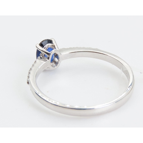 112 - Four Claw Set Sapphire Ring Mounted in 18 Carat White Gold with Further Diamonds Set to Band Ring Si... 