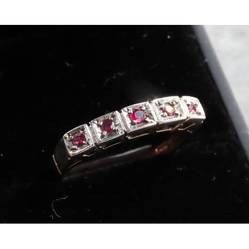 116 - Five Stone Ruby Ring Mounted on 9 Carat Yellow Gold with Silver Setting Ring Size O